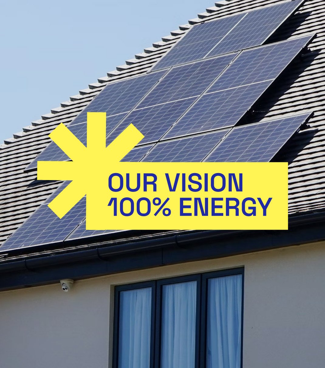 Solar panels on roof with yellow text overlay: Our vision 100% energy.