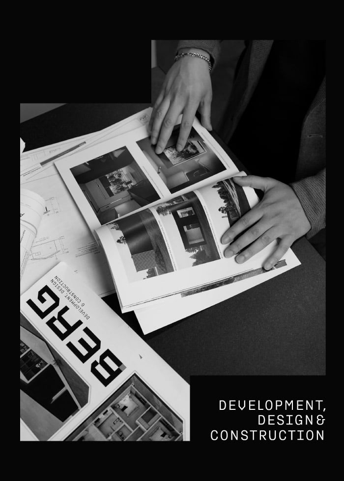 A person flipping through a BERG magazine featuring architectural photos and blueprints. The bottom right highlights the firm's focus: **Development, Design & Construction**.